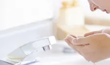 Bioderma - woman washing her face